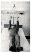 arms holding onto trapeze