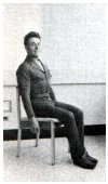sitting in chair
