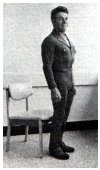 standing up from the chair
